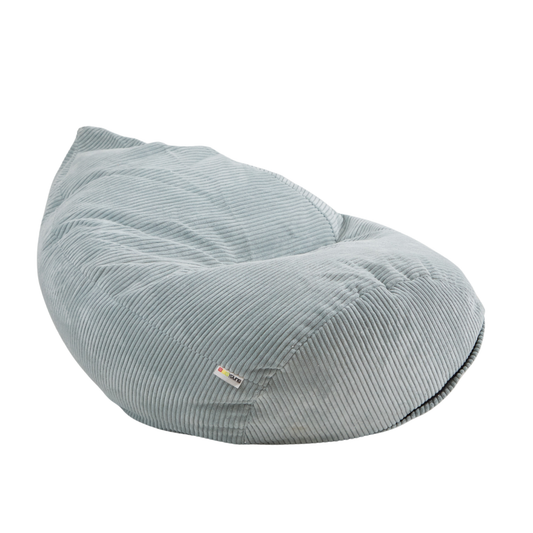 Elegancka, duża poducha wypchana granulatem styropianowym z prążkowanej tkaniny sztruksowej w kolorze błękitnym. 